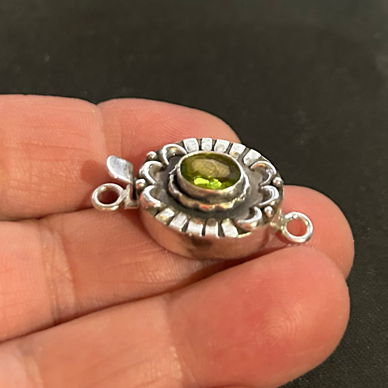 Sparkling Faceted Peridot Oval Moon and Lotus Design Sterling Clasp