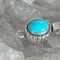 AAA Blue Sleeping Beauty Turquoise Clasp Oval 8.5x10.5mm Southwestern Design