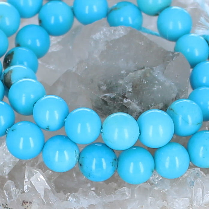 5 Star Sleeping Beauty Turquoise Beads Round 6.3mm 8"