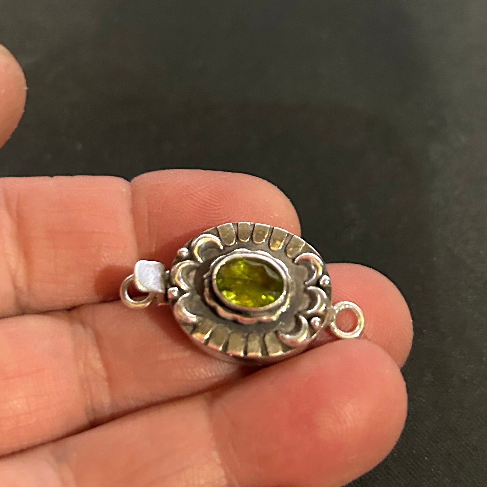 Sparkling Faceted Peridot Oval Moon and Lotus Design Sterling Clasp