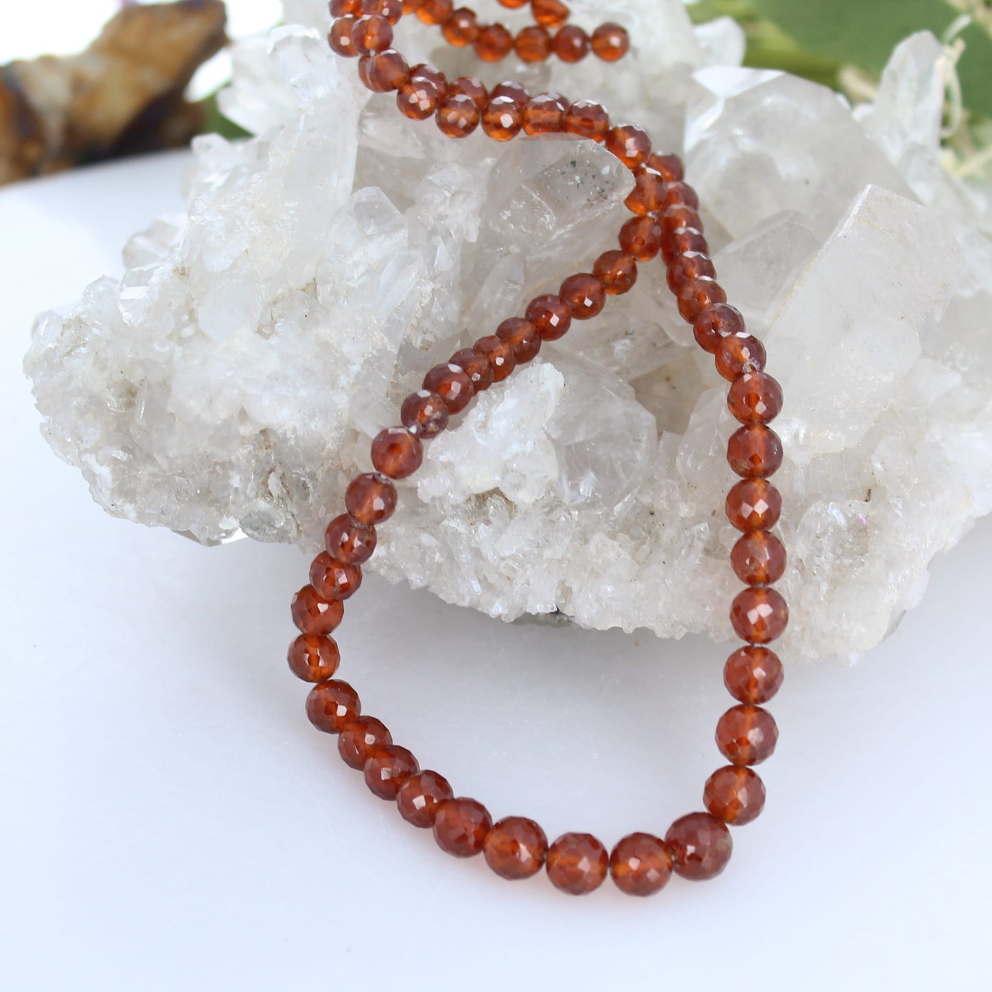 AAA HESSONITE GARNET Graduated Faceted Round Beads
