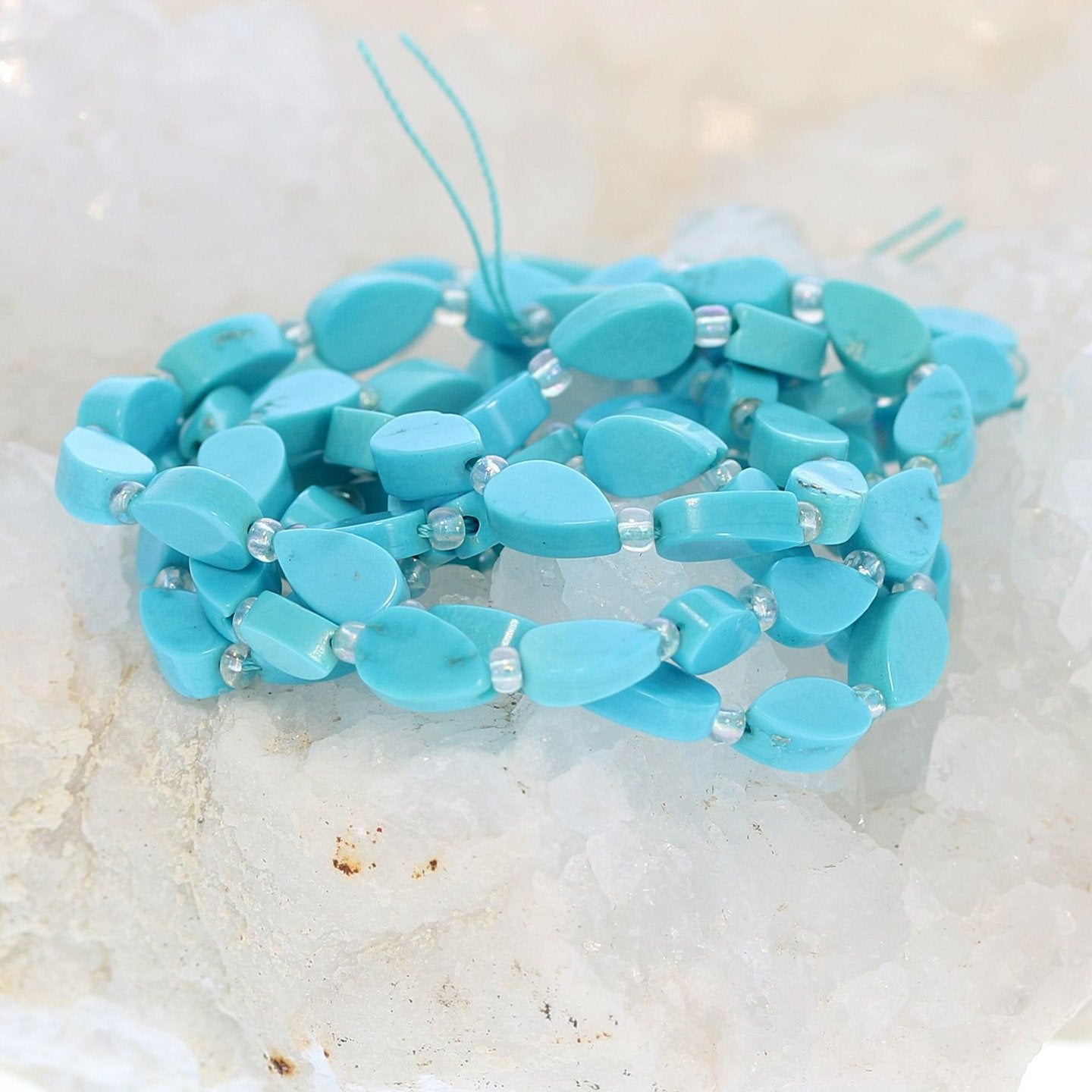 Sleeping Beauty Turquoise Teardrop Beads 8X5Mm 15 – New World Gems